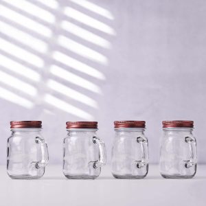 4-Pack Clear Glass Mason Jars 4oz Rustic Design with Handles and Rose Gold Screw-On Lids - Stylish Storage for Beverages & Decor